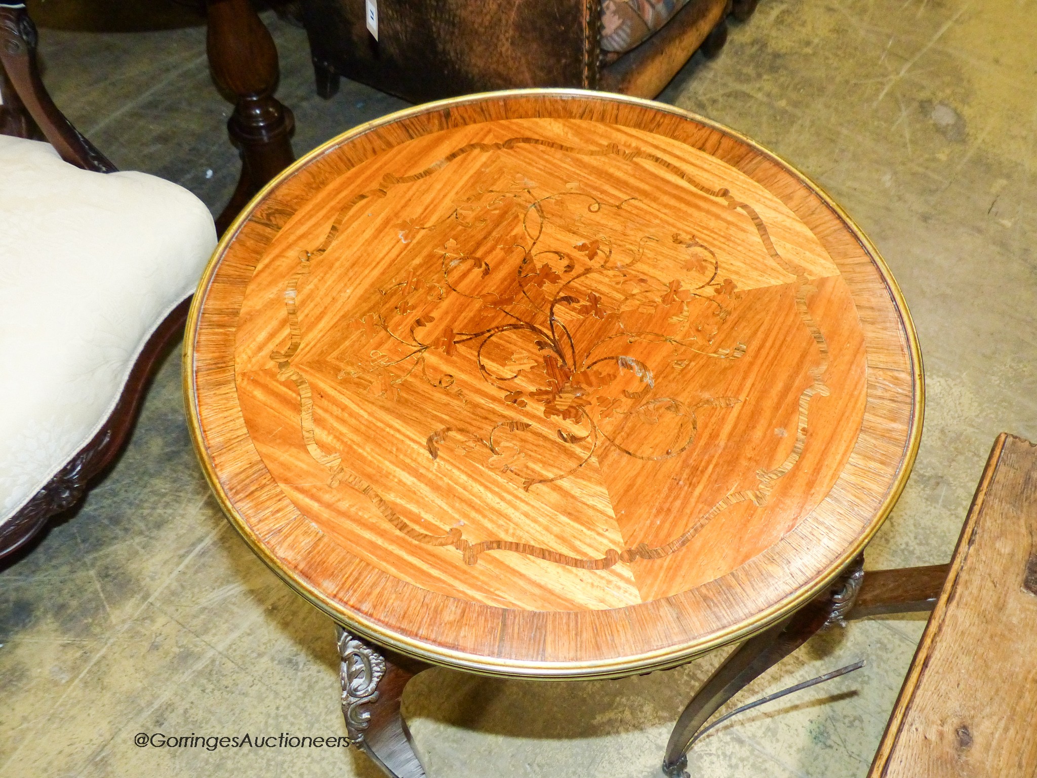 A Louis XVI style marquetry inlaid circular kingwood occasional table, diameter 50cm, height 76cm